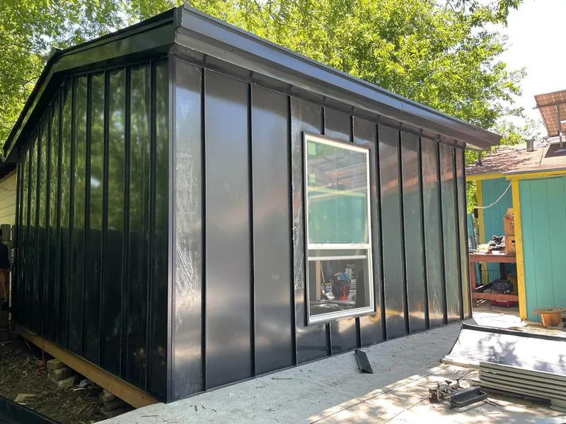 Black standing seam metal wall panels for Roof Inspection in Woodlawn