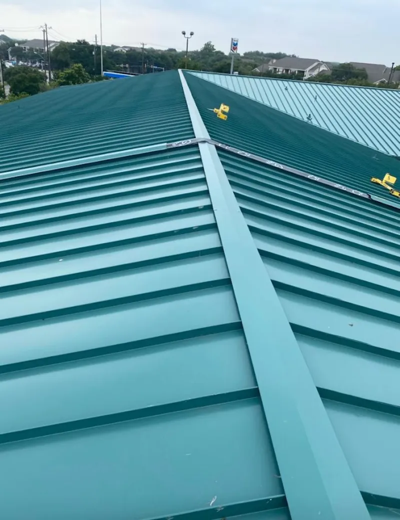 Green commercial metal roof ridge and valley for Metal Roof Repair in Woodlawn